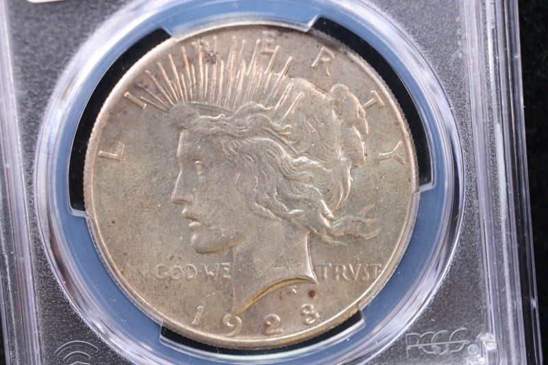 1928 Peace Silver Dollar., PCGS Graded AU-58. Store