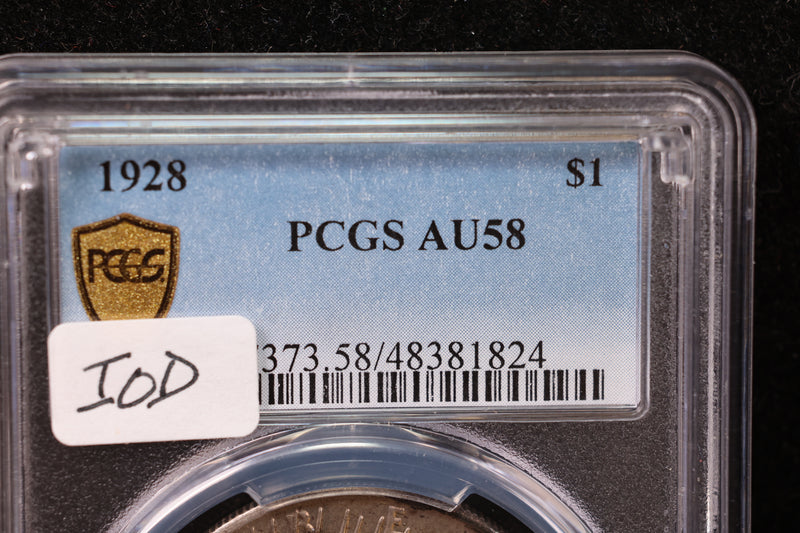 1928 Peace Silver Dollar., PCGS Graded AU-58. Store