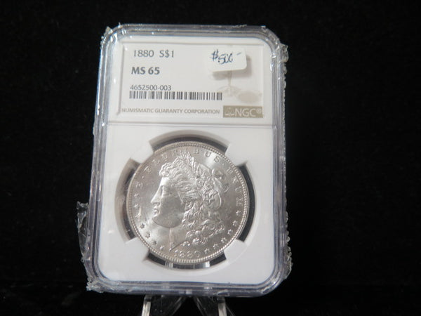 1880 Morgan Silver Dollar, NGC Graded MS 65 GEM Uncirculated. Store #03098