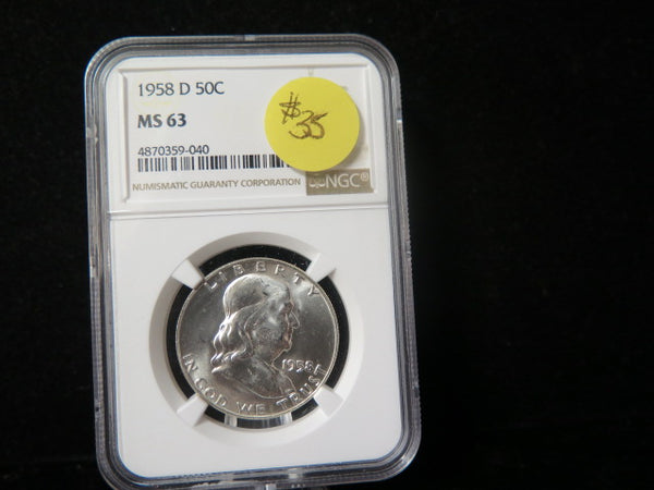 1958-D Franklin Half Dollar. NGC Graded MS 63 Uncirculated Coin. Store # 03360